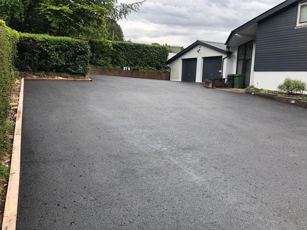 This is a photo of a asphalt driveway which is in the process of being installed by Wagga Wagga Road Tech