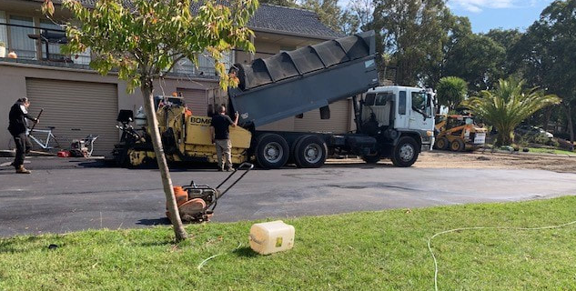 This is a photo of an asphalt driveway which is in the process of being installed by Wagga Wagga Road Tech